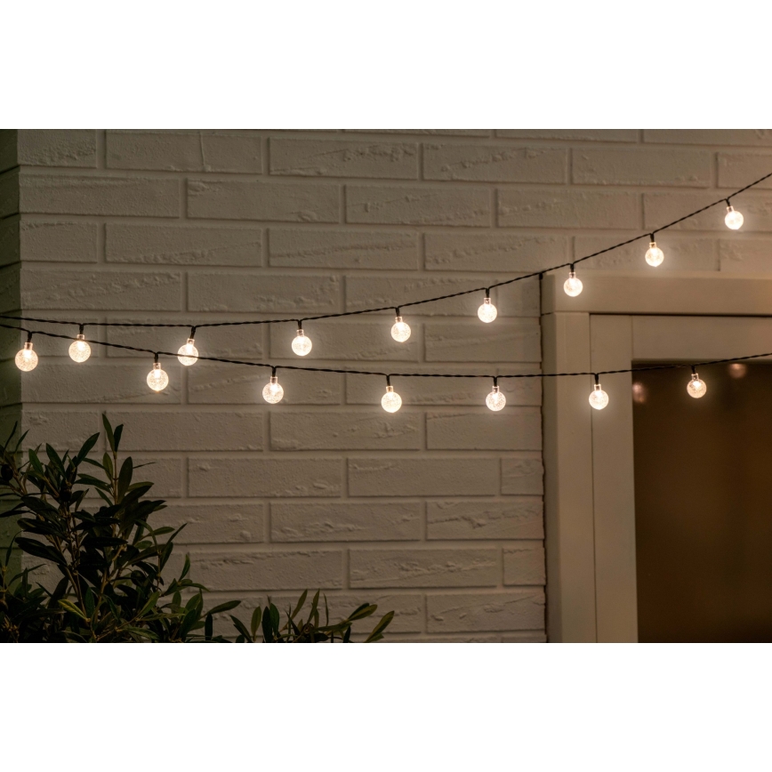 Grundig - LED Prigušivi solarni lancem 50xLED/8 funkcije 9,35m topla bela + Daljinski upravljač