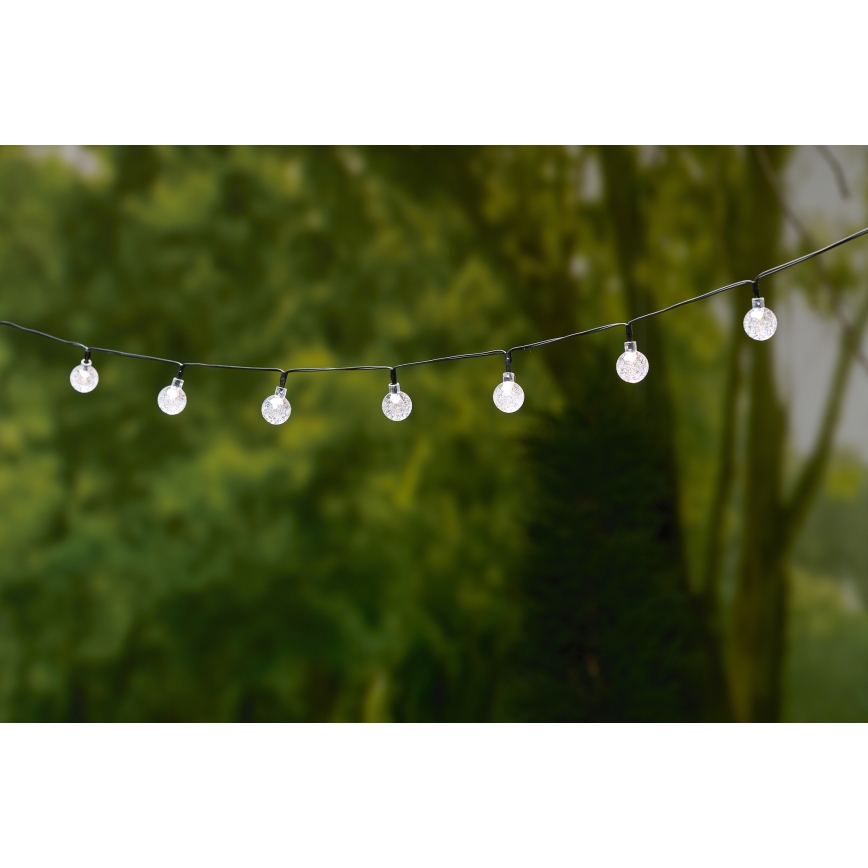 Grundig - LED Solarni lanac 50xLED/8 funkcije 6,9m topla bela