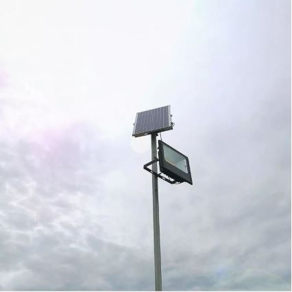 LED Prigušivi solarni reflektor LED/12W/3,2V 6000K IP65 5000 mAh + Daljinski upravljač