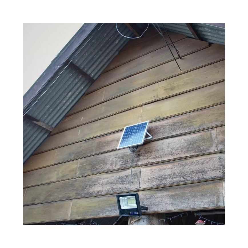 LED Prigušivi solarni reflektor LED/12W/3,2V 6000K IP65 5000 mAh + Daljinski upravljač