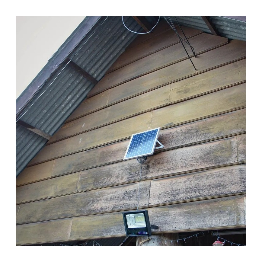 LED Prigušivi solarni reflektor LED/20W/6,4V 4000K IP65 + Daljinski upravljač