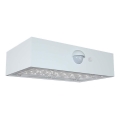 LED Solarna zidna lampa sa senzorom LED/3W/3,7V 3000K/4000K IP65 bela